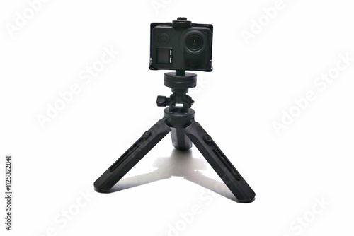 action camera with tripod accessory. isolated on white background