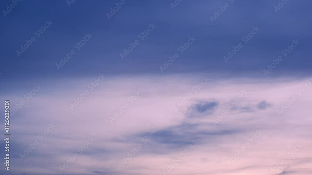 A time-lapse, where the colors of a burning sunset - blend into a romantic and colorful. Stock footage. Timelapse. Sunset sky background. 4K.
A time-lapse, where the colors of a burning sunset - blend into a romantic and colorful. Stock footage. Timelapse. Sunset sky background. 4K.
