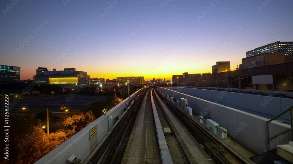 POV Time-lapse from front of Automated subway Yurikamome line in Tokyo Japan during twilight circa 2024. POV Time-lapse from front of Automated subway Yurikamome line in Tokyo Japan during twilight circa 2024.