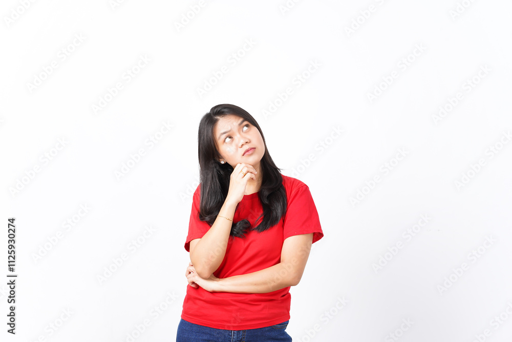 Looking up hand on chin and doing thinking gesture Of Beautiful Asian Woman Wearing red shirt Isolated On White Background Looking up hand on chin and doing thinking gesture Of Beautiful Asian Woman Wearing red shirt Isolated On White Background
