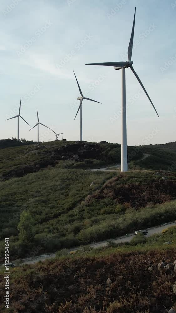 Traveling in Mountain Road with Windmills Vertical Video Traveling in Mountain Road with Windmills Vertical Video