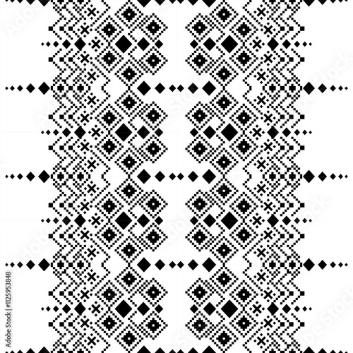 A striking black and white geometric pattern inspired by traditional ethnic art. The design features a repeating motif of diamonds, squares, and crosses, creating a bold and graphic look. 