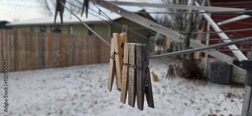 cloth pins on a cloth line in winter