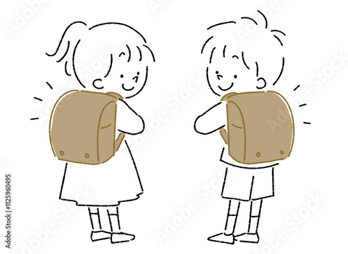 ランドセルを背負って振り向く後ろ姿の子供