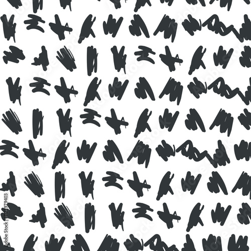 Small spots in the form of strokes or hatched formations