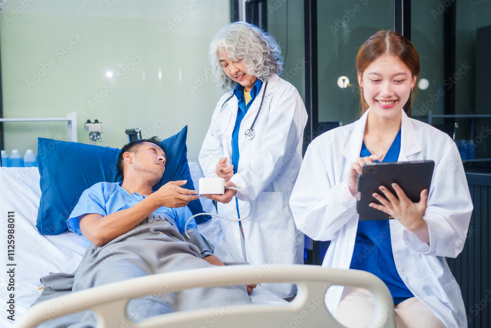 Two female doctors examine a patient lying on a hospital bed,discuss the medical chart,administer medicine,and provide encouragement, ensuring compassionate care and fostering the patient's recovery Two female doctors examine a patient lying on a hospital bed,discuss the medical chart,administer medicine,and provide encouragement, ensuring compassionate care and fostering the patient's recovery