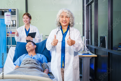 Two female doctors examine a patient lying on a hospital bed,discuss the medical chart,administer medicine,and provide encouragement, ensuring compassionate care and fostering the patient's recovery