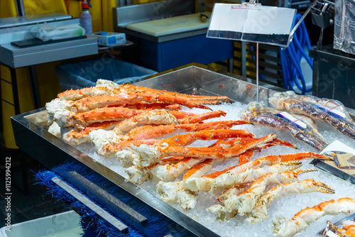 Steamed king crab legs at seafood market in Osaka Japan. photo