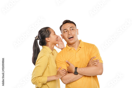 portrait of asian couple indoors talking about something in whispers