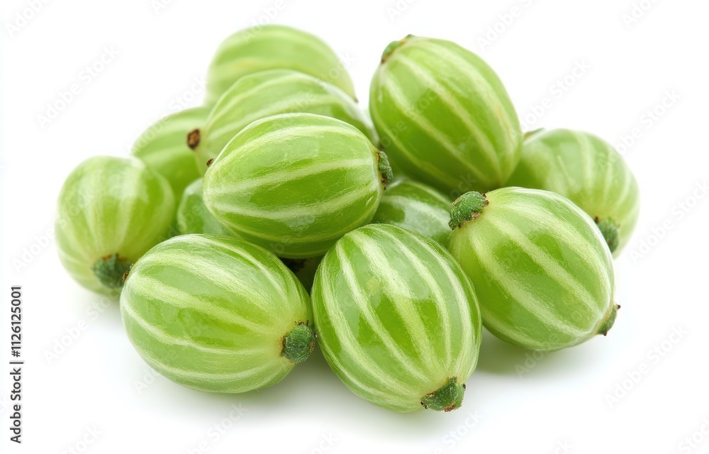 A pile of green, striped gooseberries on a white background. A pile of green, striped gooseberries on a white background.