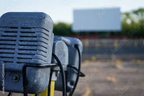 Closeup of Retro Speaker at a Drive-In Movie Theater in Daylight photo