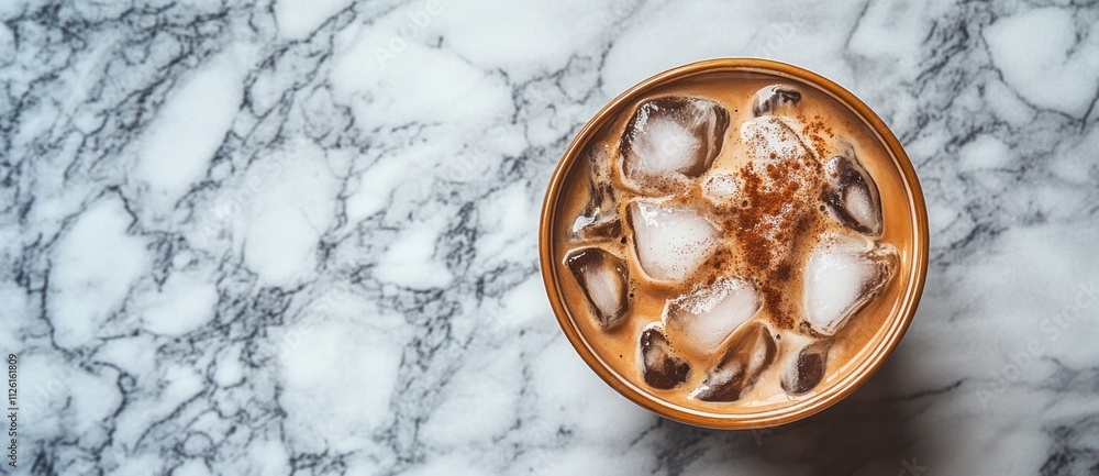 A refreshing iced coffee in a bowl, surrounded by ice on a marble surface. A refreshing iced coffee in a bowl, surrounded by ice on a marble surface.