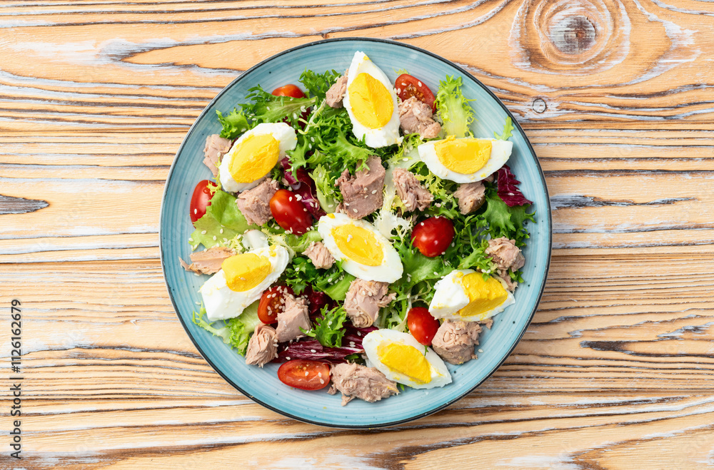 Canned Tuna salad with eggs and tomatoes photography . Top view Canned Tuna salad with eggs and tomatoes photography . Top view