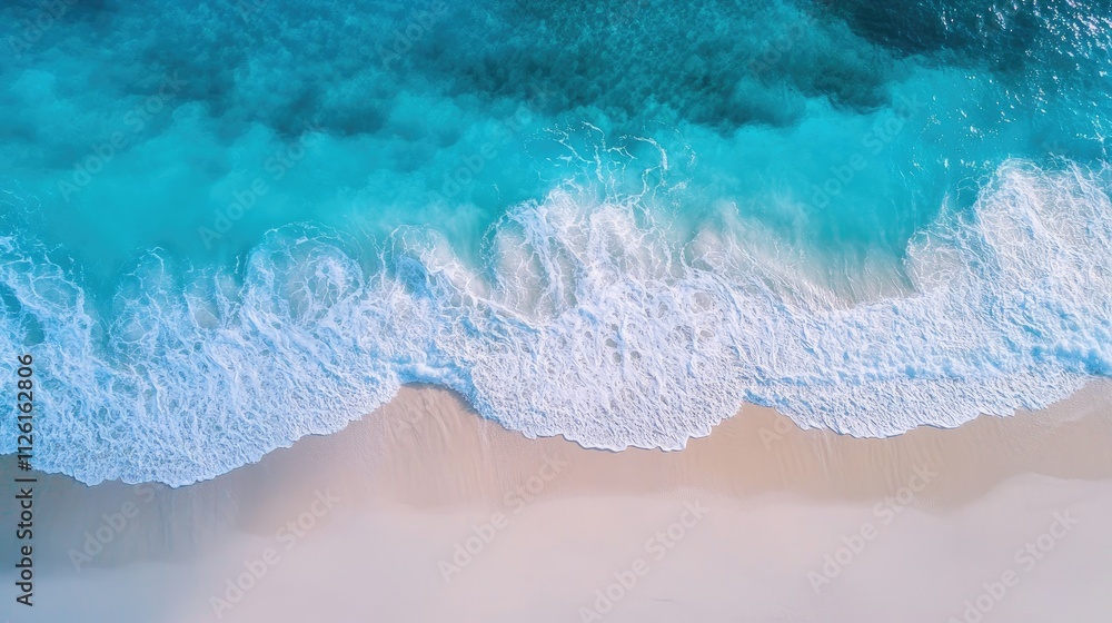 Aerial view of smooth beach sand with intricate lines and waves formed by tidal movements Aerial view of smooth beach sand with intricate lines and waves formed by tidal movements