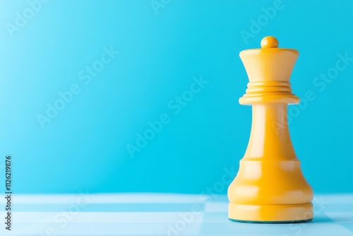 A single yellow chess king piece stands against a bright blue background, symbolizing strategy and competition.