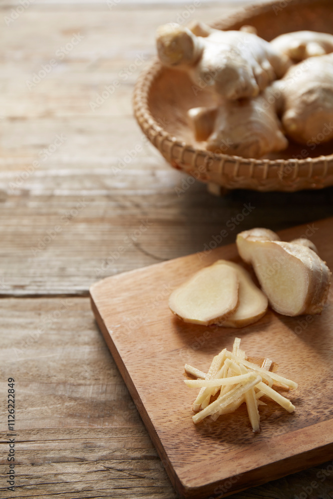 Ginger in a basket and cut ginger Ginger in a basket and cut ginger