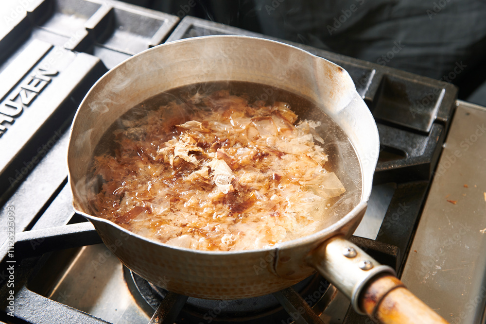 © amanaimages - The process of making bonito broth.
