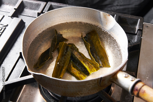 The process of taking kelp soup stock photo