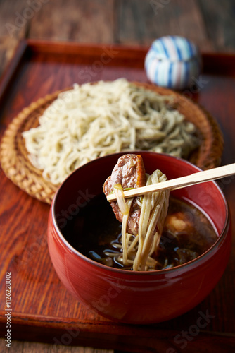 Photograph of the process of making duck seiro soba photo