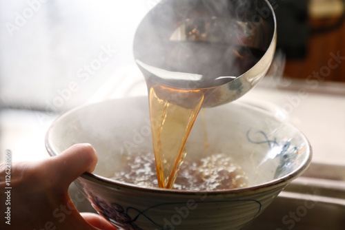 Photographs of Soba and udon soup pours