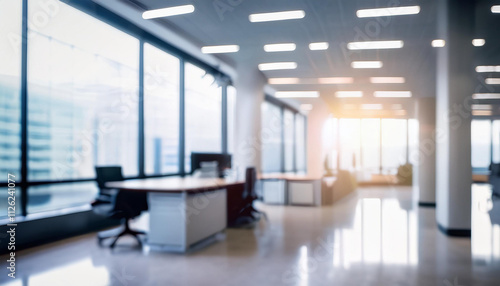 Blurred empty open space office. Abstract light bokeh at office interior background