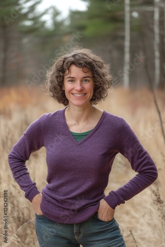 A passionate 36-year-old female environmental policy researcher modeling complex ecosystem interactions