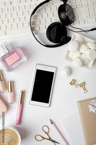 top view office table desk. female office workspace desk with notebook keyboard, cosmetics on white background