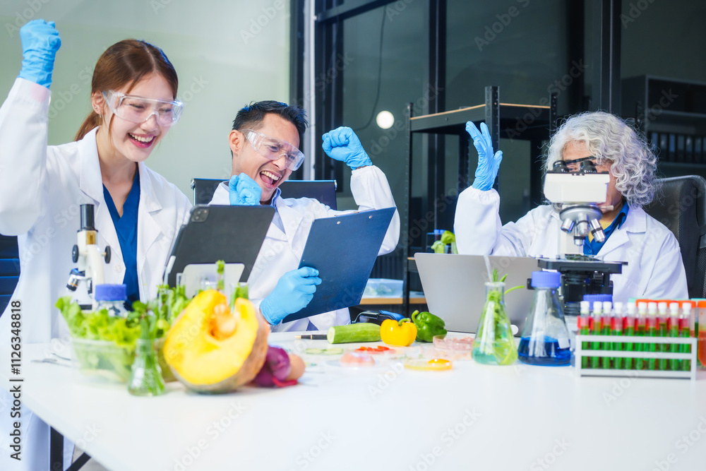 A male scientist and two women conduct plant research in a laboratory. microscopes, petri dishes,test tubes to analyze genetically modified plants, food, meat, eggs,vegetables for nutritional value A male scientist and two women conduct plant research in a laboratory. microscopes, petri dishes,test tubes to analyze genetically modified plants, food, meat, eggs,vegetables for nutritional value