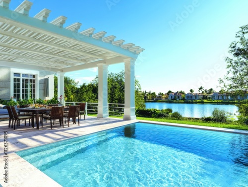 luxurious outdoor living space with pool and lake view photo