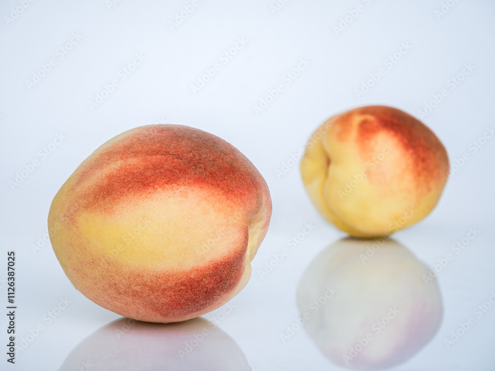 White Swan Peaches Isolated on White Background with Reflection White Swan Peaches Isolated on White Background with Reflection