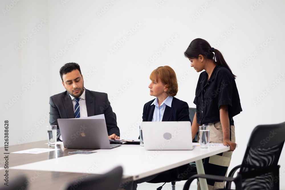 Business meeting - Group of friends meeting at home. Diverse business people asian woman and caucasian man discussion in corporate meeting at conference room Business meeting - Group of friends meeting at home. Diverse business people asian woman and caucasian man discussion in corporate meeting at conference room