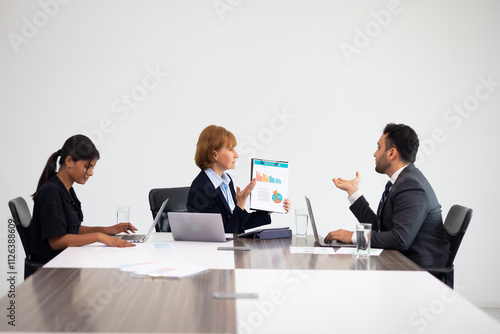 Business meeting - Group of friends meeting at home. Diverse business people asian woman and caucasian man discussion in corporate meeting at conference room