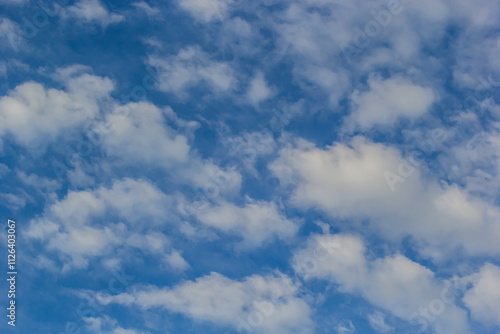 Ornamental clouds. Dramatic sky. Epic storm cloudscape Soft sunlight. Panoramic image texture background graphic resources design Meteorology, heaven hope peace concept