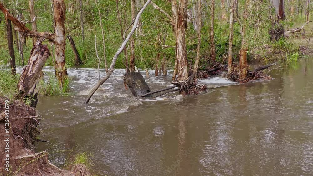 4K video, Flooded flooding creek stream river, water over road, dangerous strong current, traffic hazard, climate change, Queensland Australia 4K video, Flooded flooding creek stream river, water over road, dangerous strong current, traffic hazard, climate change, Queensland Australia