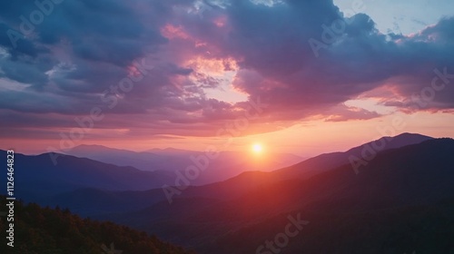 breathtaking sunset over mountains with dramatic clouds