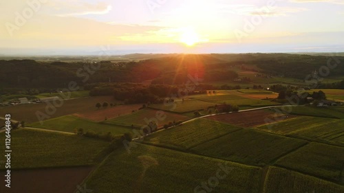 Stunning 4k aerial footage of a drone filming a rainbow in a rural European area. Filmed in Slovenian countryside - city of Ormož (Prlekija). Summer time. photo