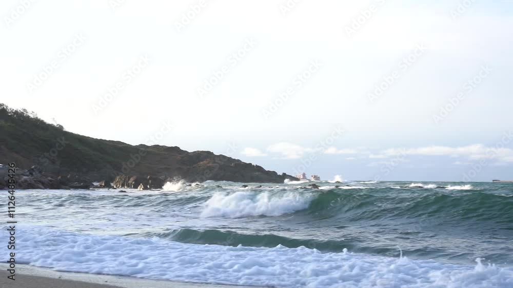 Serene coastal landscape with turquoise waters and rocky shore Serene coastal landscape with turquoise waters and rocky shore