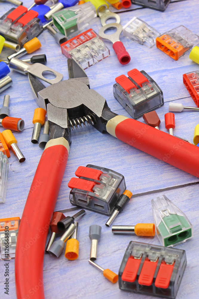 A tool for installing equipment in an electrical switchboard. Soft focus. Close-up. A tool for installing equipment in an electrical switchboard. Soft focus. Close-up.