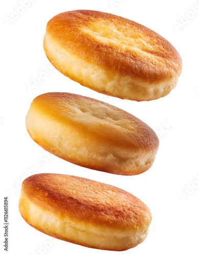 Burger buns falling on a clear background, showcasing the soft texture and golden hue of freshly baked bread photo