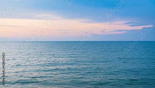 Breathtaking Blue Sea and Pink Sky: A Stunning Display of Natures Beauty Captured in .jpg, Showcasing Serene Waters and Vibrant Skies at Sunset or Sunrise