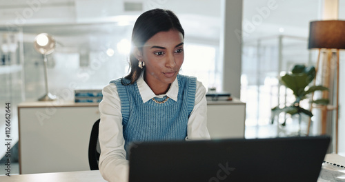 Cuadro en lienzo Accounting, laptop and reading with business Indian woman at desk in office for bookkeeping report