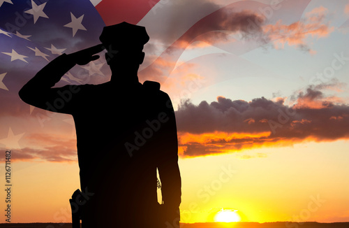 Принти на полотні Silhouette of a police officer against the sunset