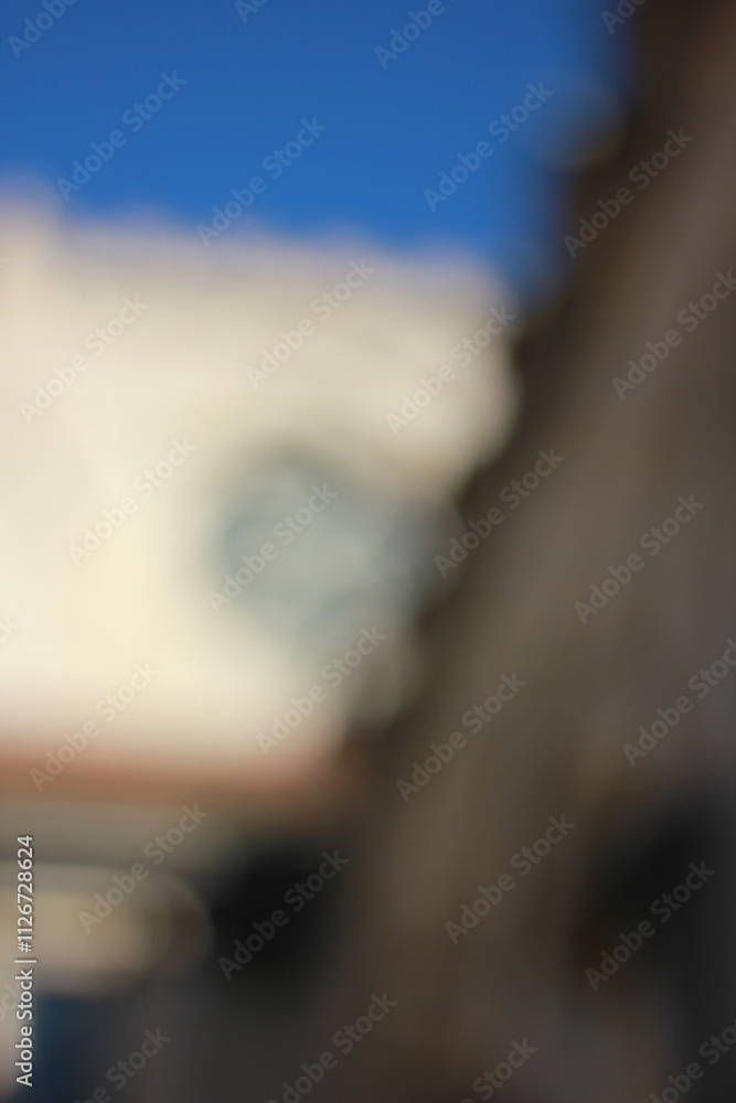 A dreamy view of a white tower.