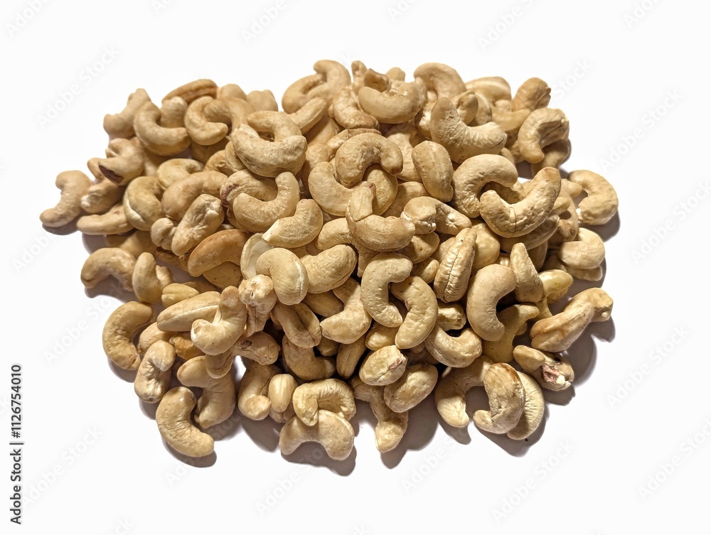 Cashew nuts on the white background stock photo Cashew nuts on the white background stock photo