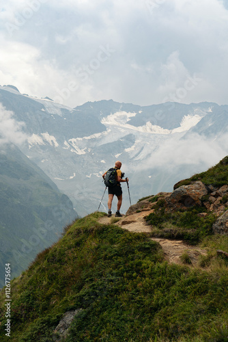 hiker on the top of mountain