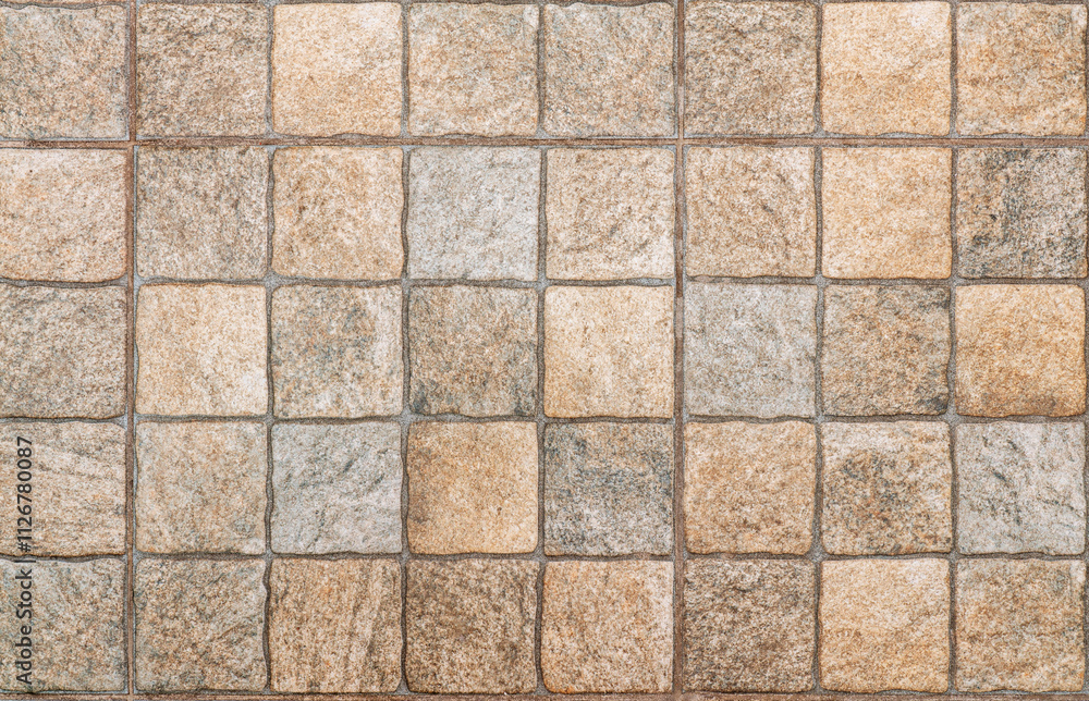 Beige square ceramic tiles in close-up, forming a seamless pattern ideal for interior design backgrounds and textures Beige square ceramic tiles in close-up, forming a seamless pattern ideal for interior design backgrounds and textures