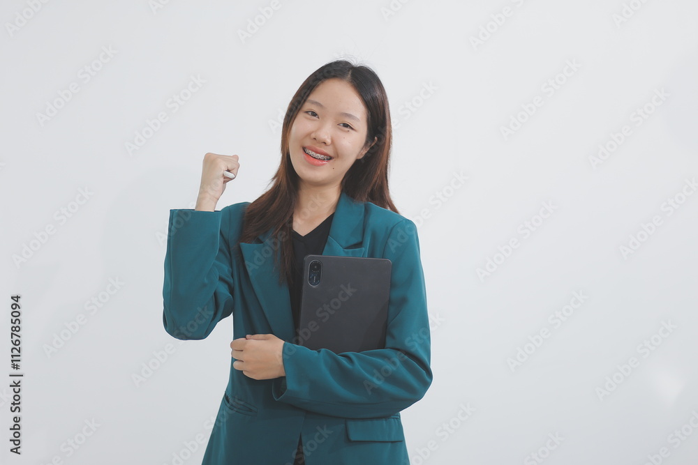 Attractive elegant young asian business woman using digital tablet standing on isolated background. Happy young latin female formal black suit holding tablet gadget working service with customer Attractive elegant young asian business woman using digital tablet standing on isolated background. Happy young latin female formal black suit holding tablet gadget working service with customer