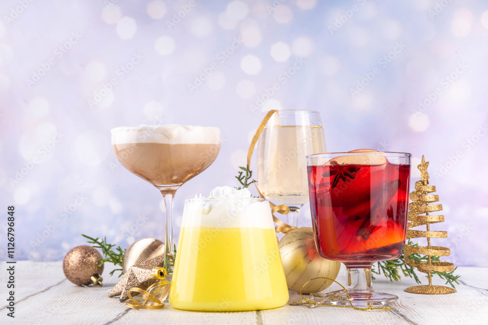 Christmas and New Year winter holiday festive season bar menu, with alcohol cocktails set. Four various glass and alcoholic drinks - spiced eggnog, mulled wine, gingerbread crumbs martini, champagne Christmas and New Year winter holiday festive season bar menu, with alcohol cocktails set. Four various glass and alcoholic drinks - spiced eggnog, mulled wine, gingerbread crumbs martini, champagne