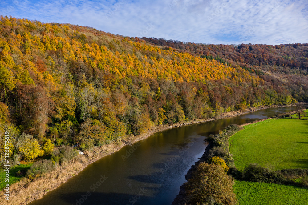 Drone image of the River Wye at Tintern with autumn foliage Drone image of the River Wye at Tintern with autumn foliage