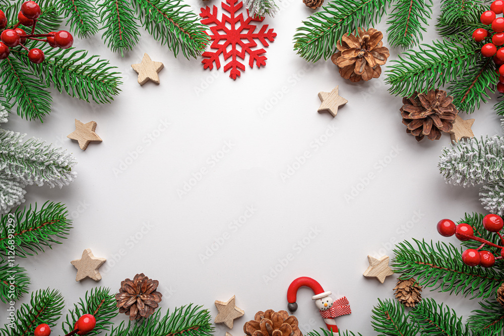 Christmas background. Christmas eve concept. Top view of gift boxes, fir branches, toys, on white background.
